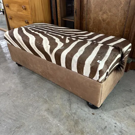 Zebra skin & leather ottoman