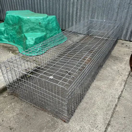 Long cage with top access
