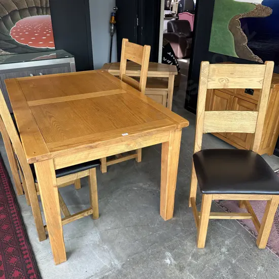 Solid Oak table 1400 x 900 with matching leather seat chairs