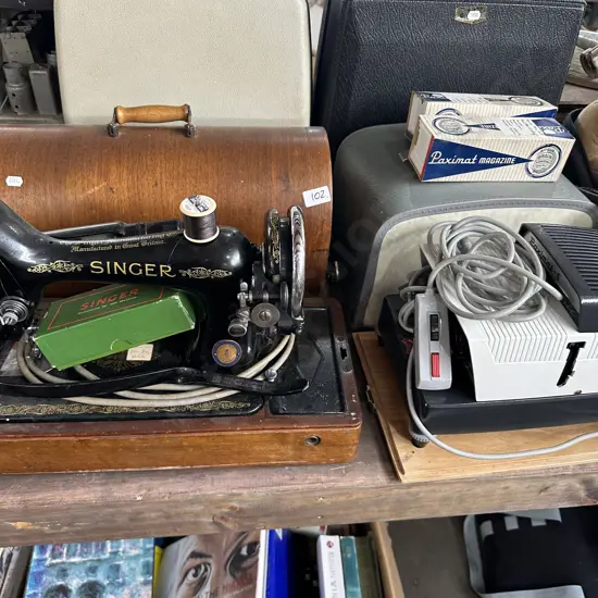 Slide projector and sewer