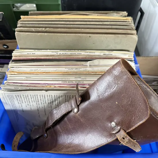 Records and leather satchel