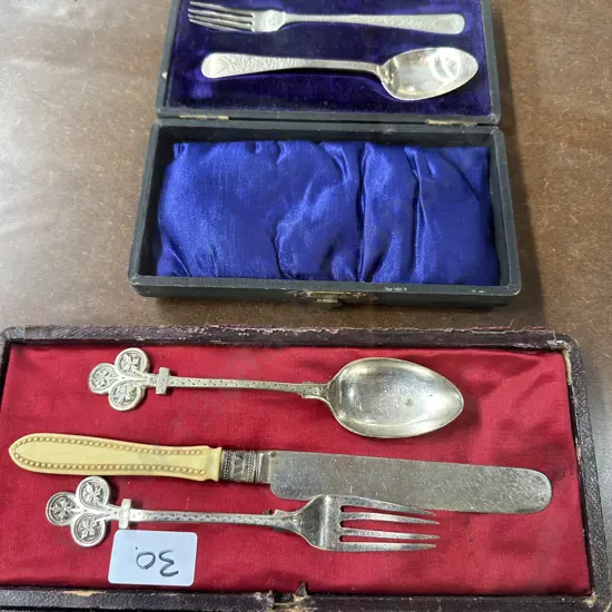 2 cased sets, one Sterling