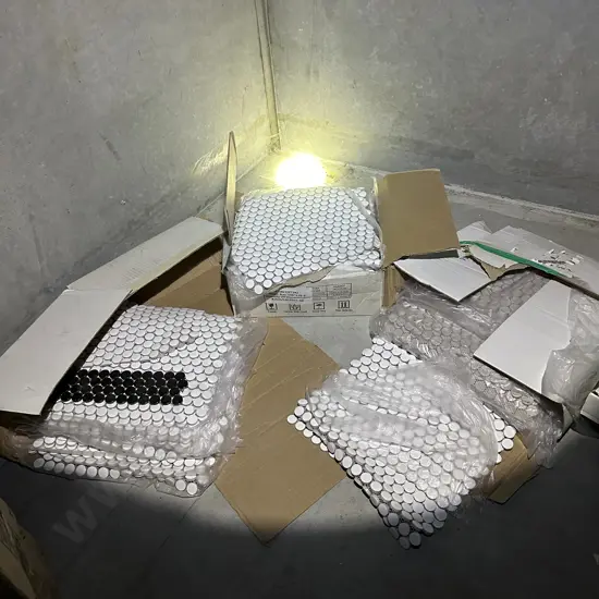 Large lot sheets of small round tiles