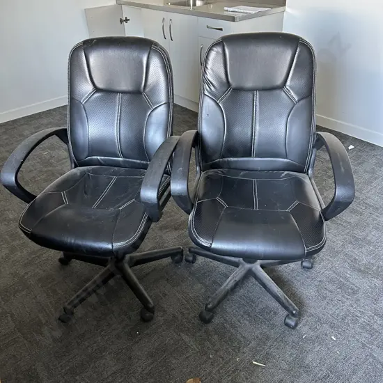 2 office chairs (small tears)