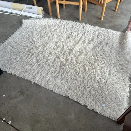 Pr of Flokati wool rugs 1700 x 1300