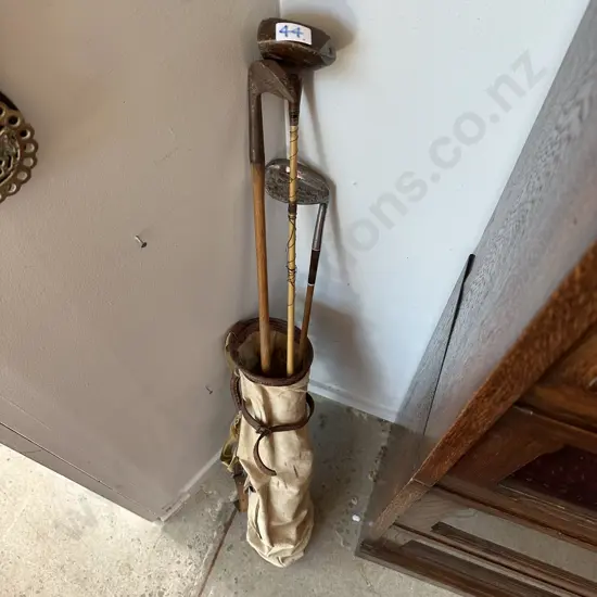 Antique golf bag and clubs