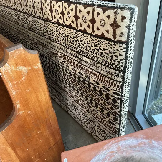 Tapa cloth headboard