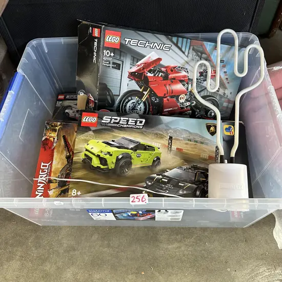 Empty Lego boxes, lamp and bin