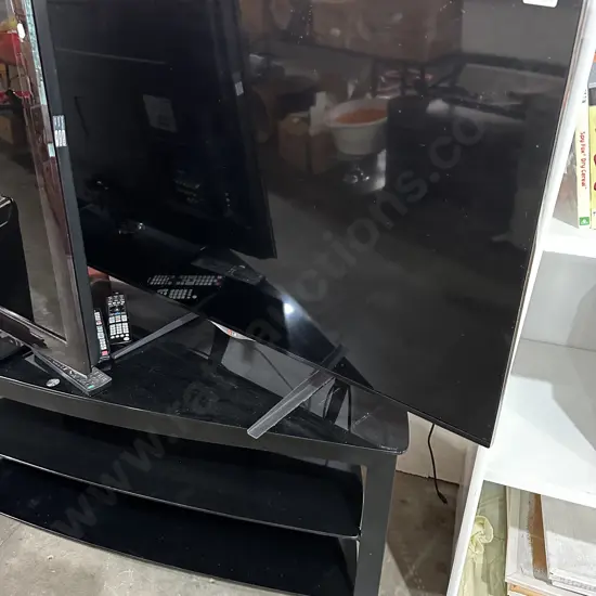 LG 49inch (small chip on corner casing) plus TV console