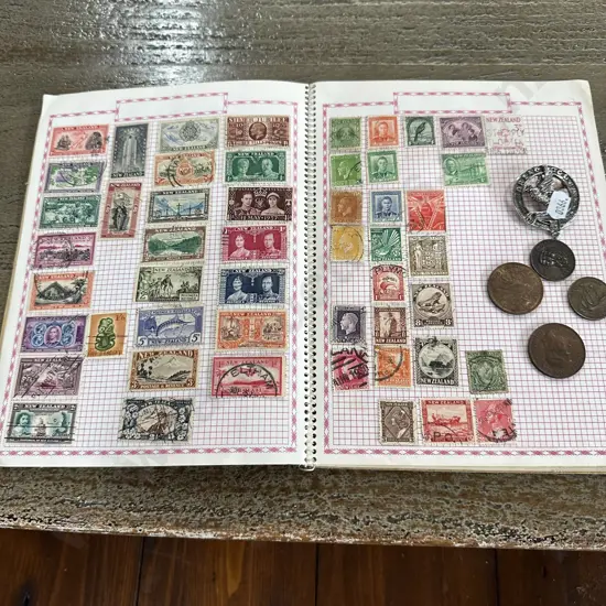 Stamps, coins and brooch