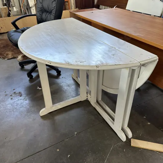 Folding dropside table