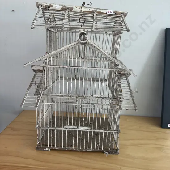 Fragile wooden birdcage
