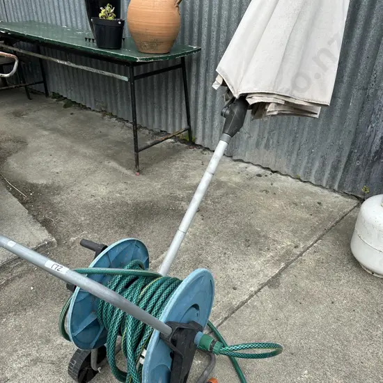Umbrella and hose reel