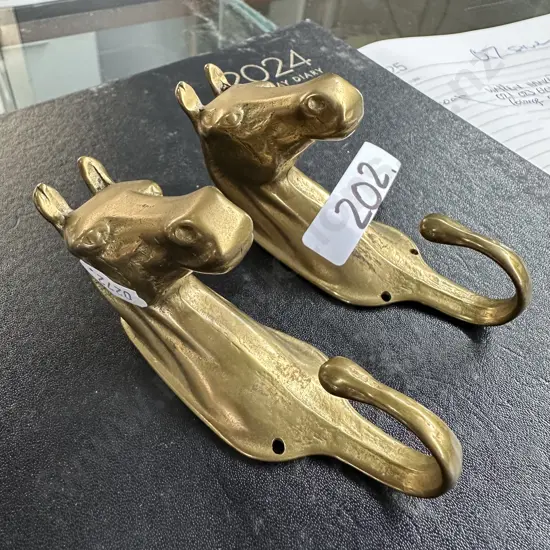 Brass horse coat hooks