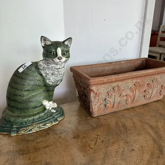 Cast iron door stop plus planter (chip)