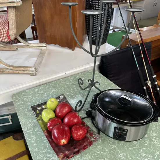 Cooker, candle, fruit bowl