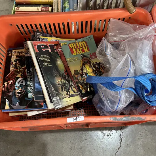 bin of comics and strops