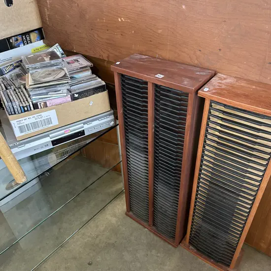 CD and DVD stands, player and CDs