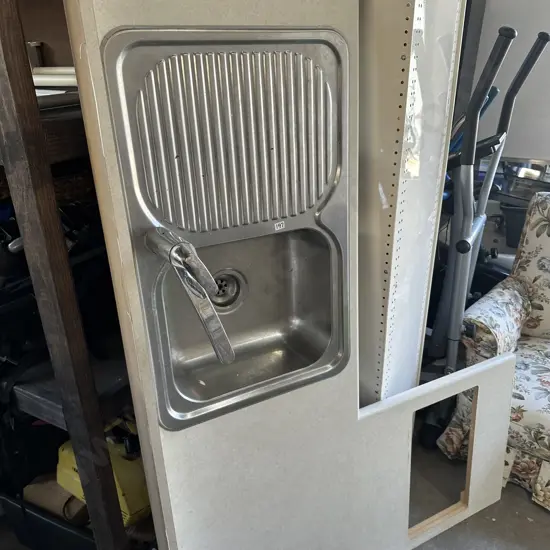kitchen bench hob and oven plus bin of items