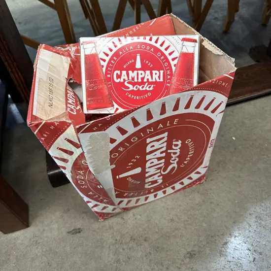 Near full carton of Campari soda boxes