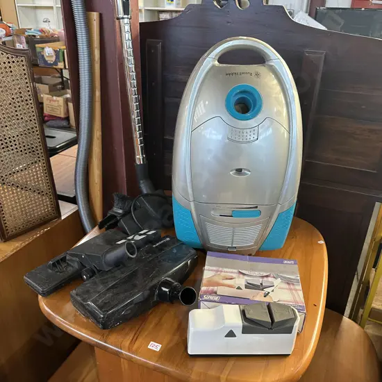 Vacuum cleaner & knife sharpener