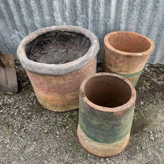 2 pots and garden art