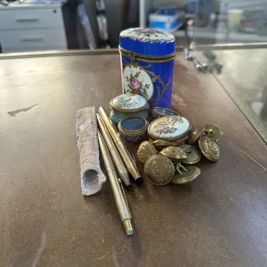 Pens, buttons, enamels