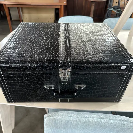 Suitcase, printer and racket