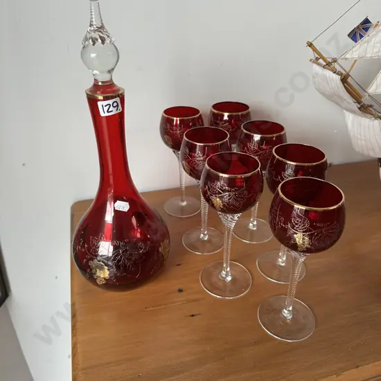 Red glass wine glasses and decanter