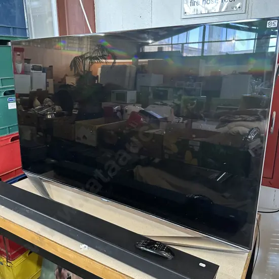 Samsung 50inch TV plus sound bar and speaker