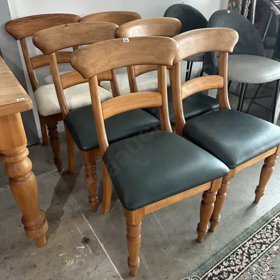 The matching set of 6 chairs (2 need leather recover)