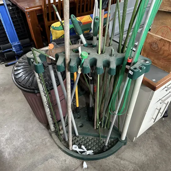 Garage garden tool stand and contents
