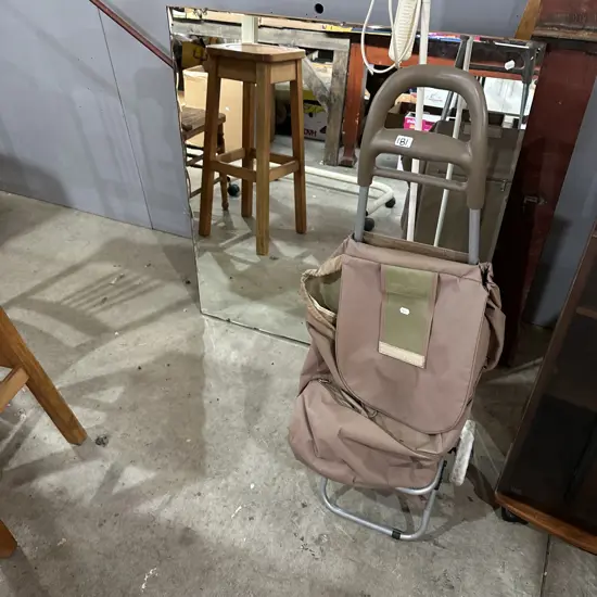 Mirror, lamp and shopping trolley