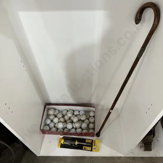 Golf balls, walk stick and tool