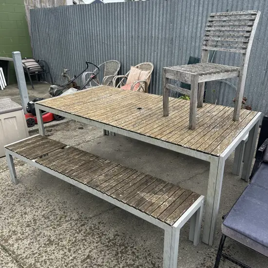 Outdoor table and bench seats plus chair - well worn