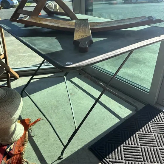 Folding metal outdoor table