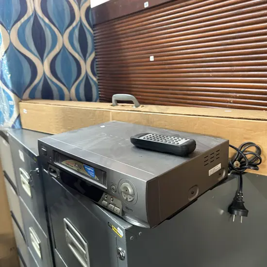 Projector screen and VHS player