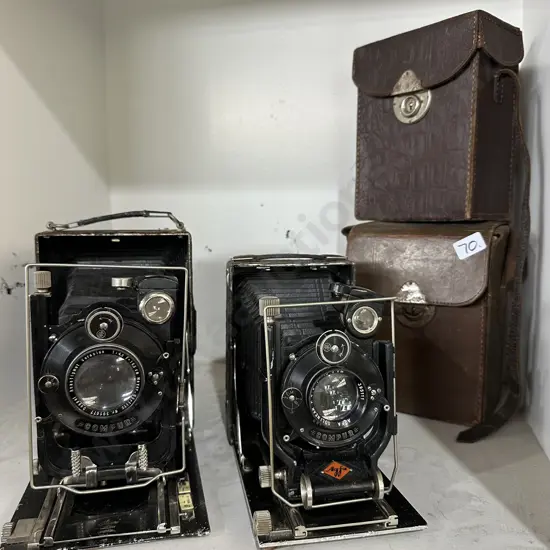 2 cased vintage cameras