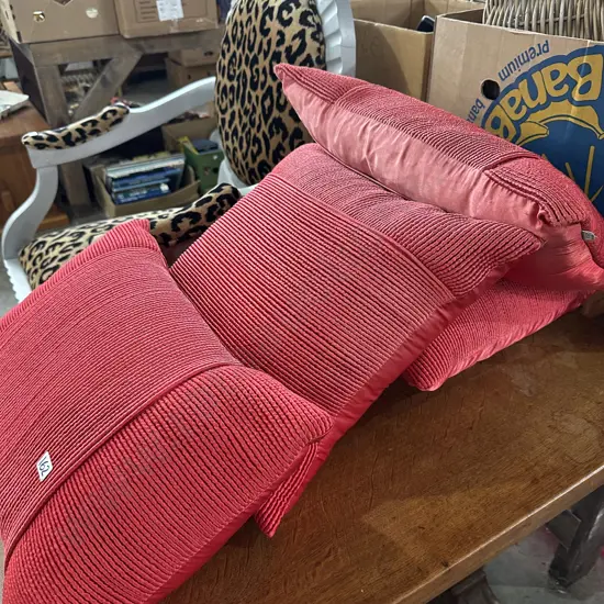 4 red cushions