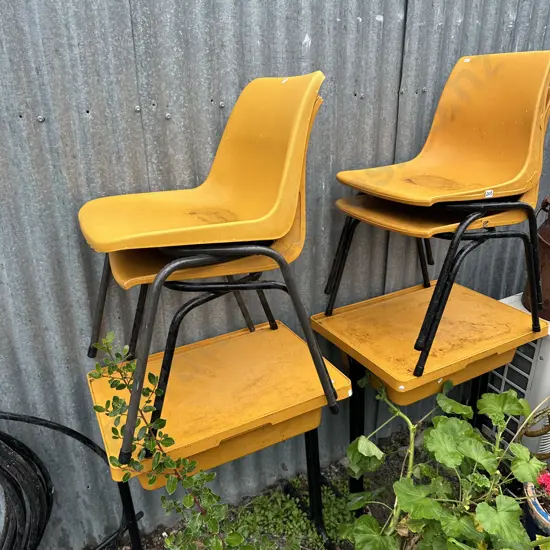 Plastic desks and chairs