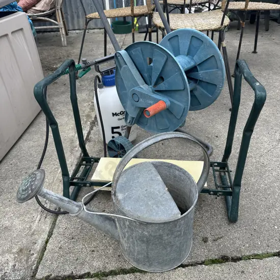 Hose reel, kneeler, water can and sprayer