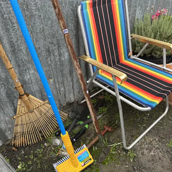 Vintage chair and garden tools