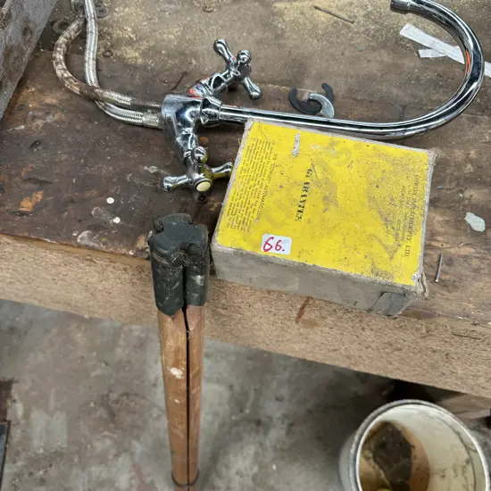 Tripod , level and tap