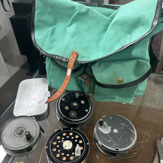 Fishing bag inc 4 x fly reels incs Young & Hardy (damaged) plus fly box