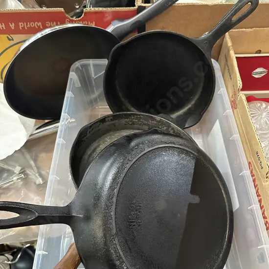 3 cast pans and 1 other