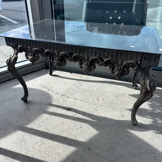 Heavy cast iron coffee table base, glass top