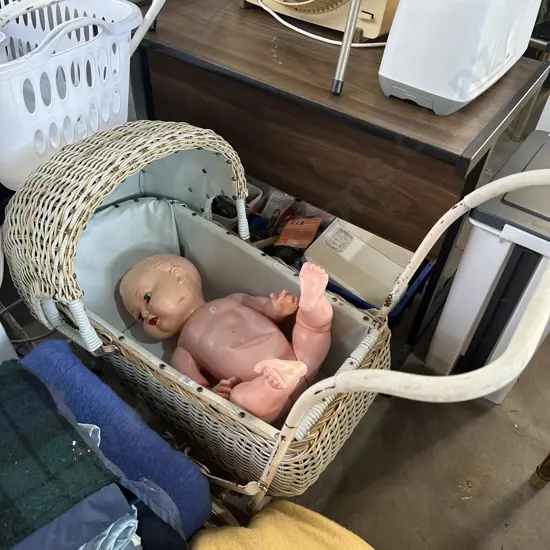 Vintage pram and doll