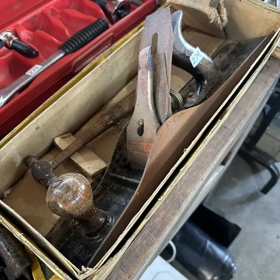 Large plane and small hammer