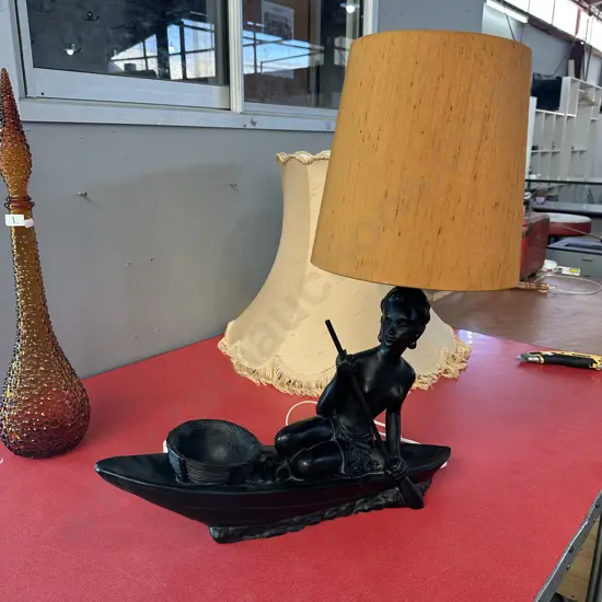 Black plaster Canoe lady with original shade (slight chip at each end)