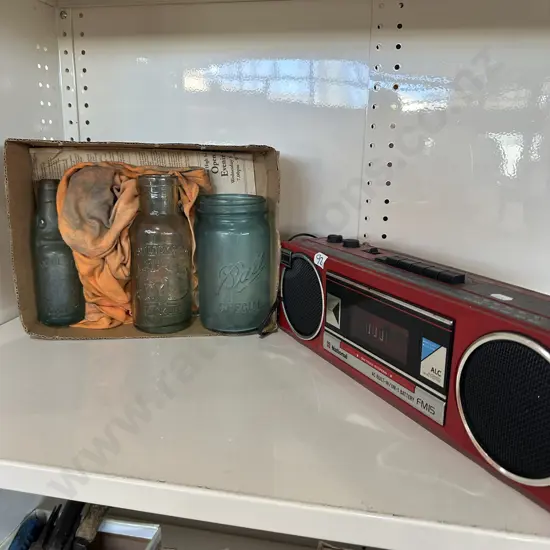 Red stereo and bottles